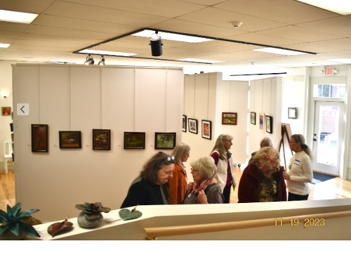 Marge chatting with artists during the show.
