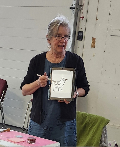 Susie instructing the class.