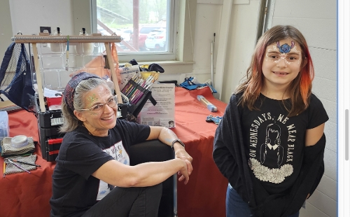 Face painting at the artists' reception!