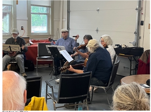 The Farley String Band performs at the artists' reception.