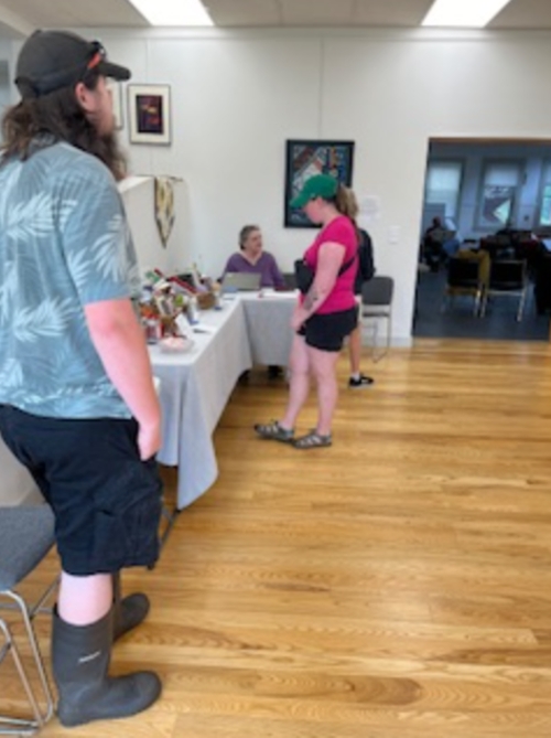 People mingle at the artists' reception.
